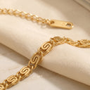 Gold Swirl Link Chain Bracelet